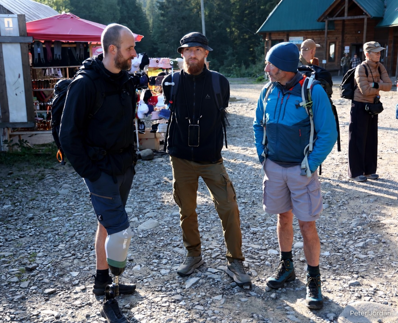 British veterans talking with a Ukrainian veteran before the climb of Mount Hoverla